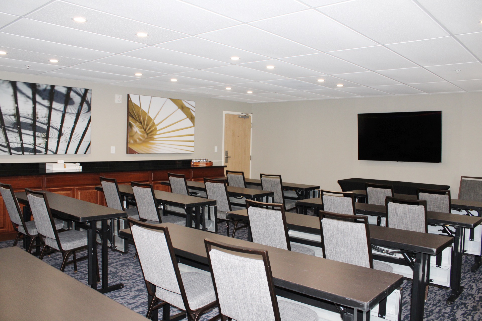 Classroom style set up of meeting rental. Call 239-437-5600 ext:2 to book meeting rental space.