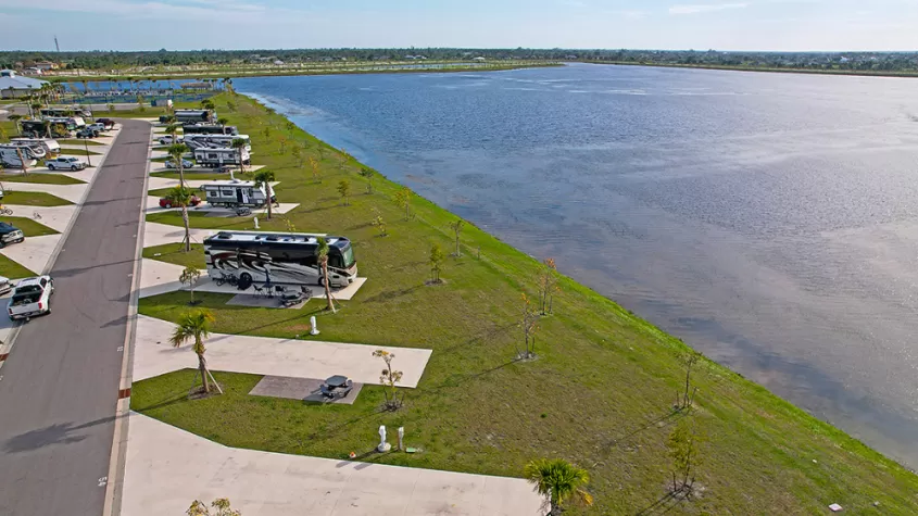 drone shot of rv resort and lake