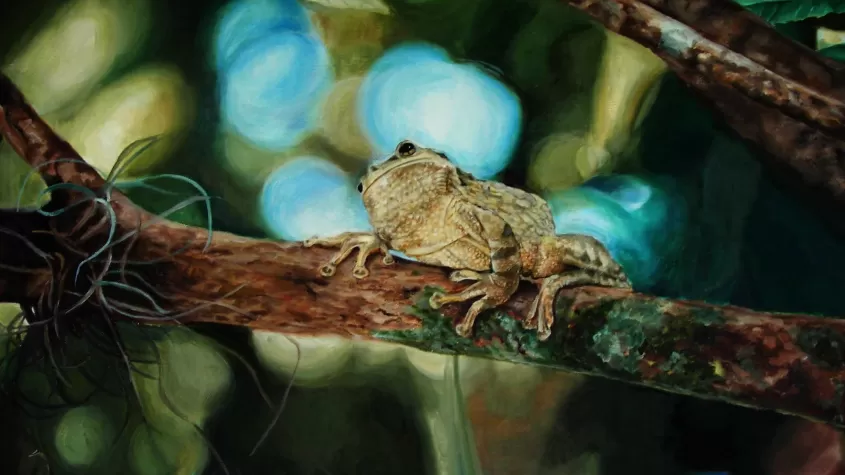 painting of a green frog on a tree branch with out of focus leaves and sky in the background