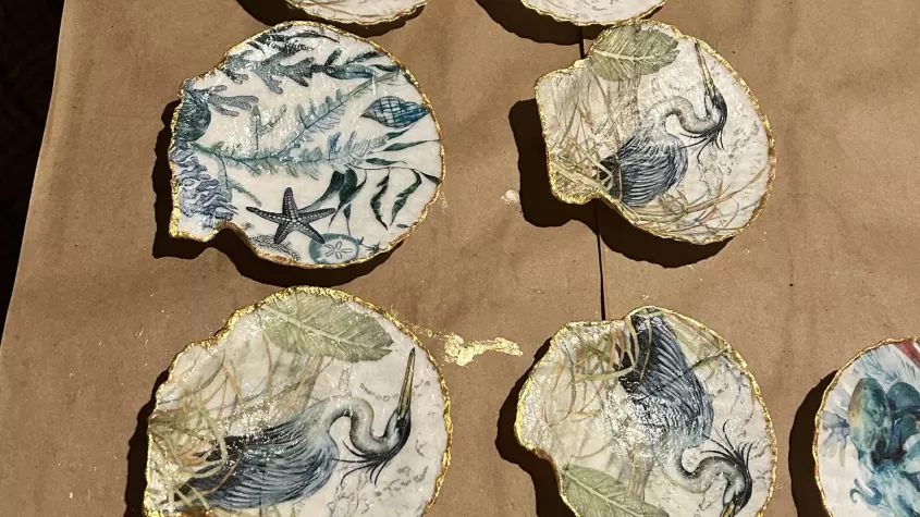 shells with patterns decoupaged on the inside and golf around the rim