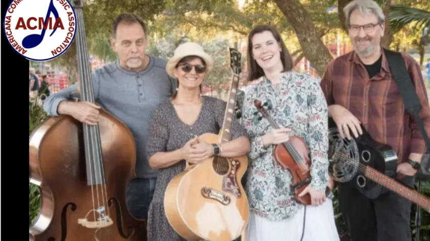 Four musicians standing, with upright bass, guitar, violin and dobro