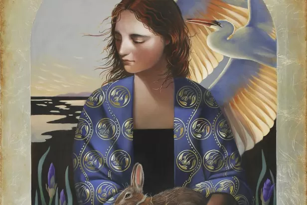 A woman with brown hair in a blue shall looking over her right shoulder under an arch with a sunset and cranes in the back and a rabbit in her arms
