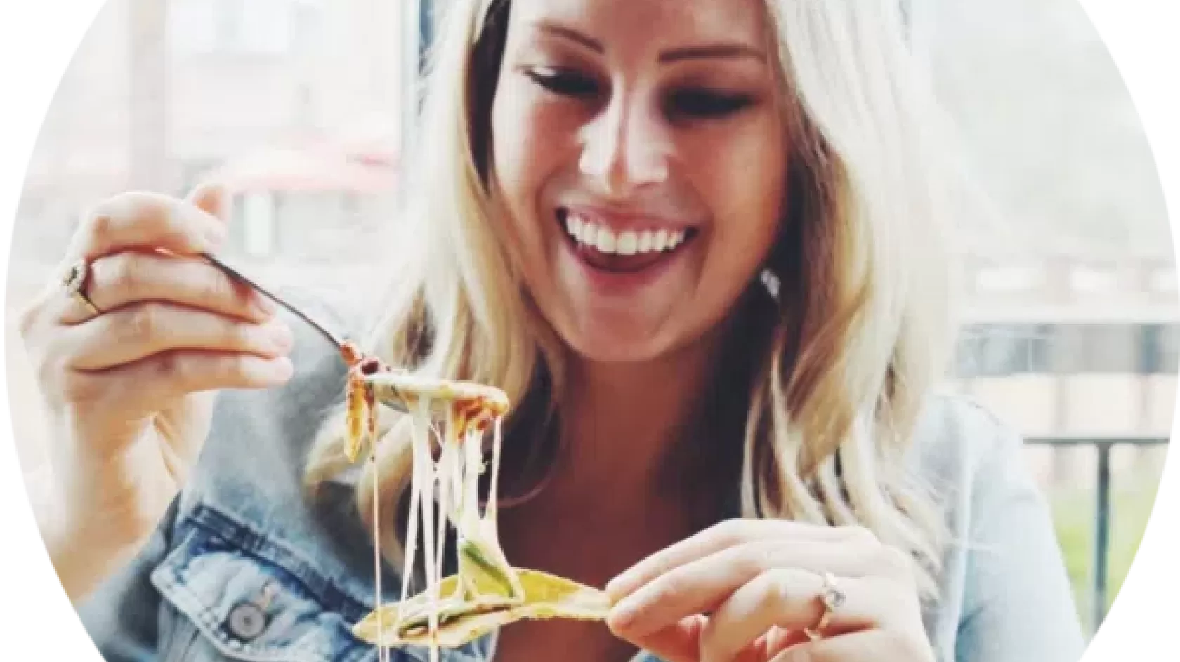 A woman enjoying pasta