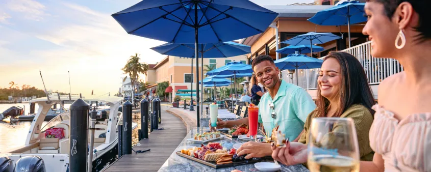 Friends dine on the water