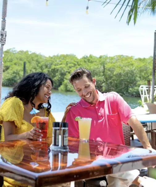 couple eating on the water