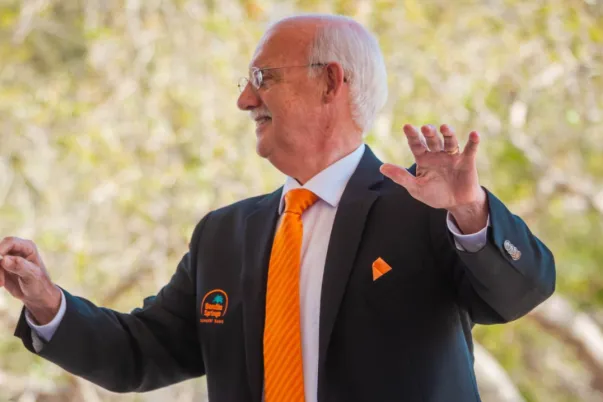 The conductor of the Bonita Springs Concert Band