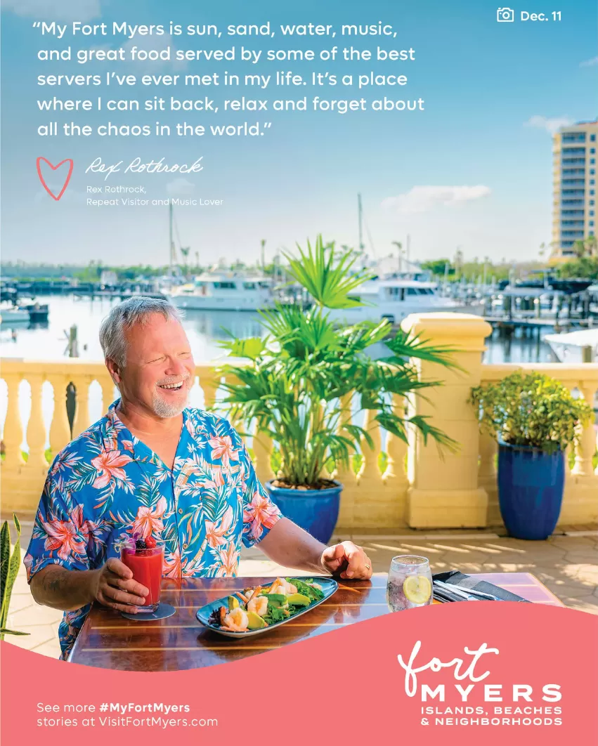 A man enjoys a meal at a table near a boat marina as featured on a print ad for the My Fort Myers campaign